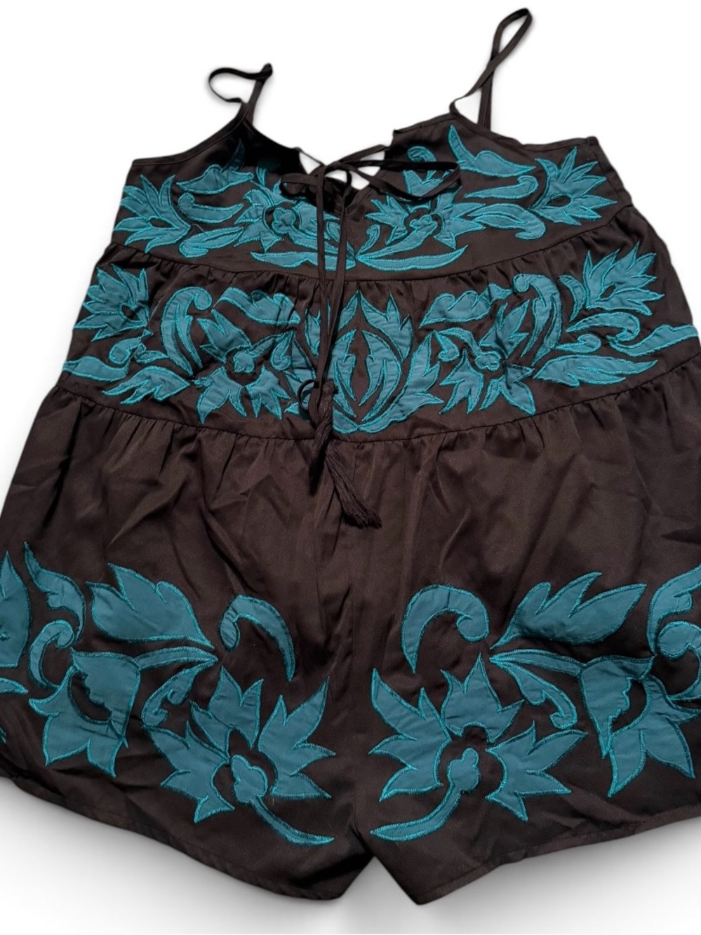 Free People size small Black Spaghetti-Strap Romper with Teal Floral Embroidery